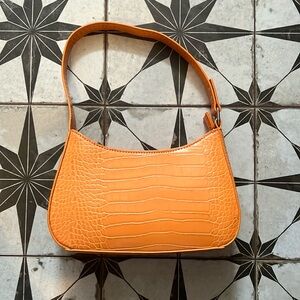 Urban Outfitters, orange, vegan leather shoulder bag.